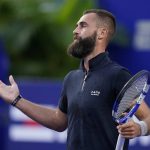 
              Benoit Paire of France gesture during a match against to Daniil Medvedev of Russia at the Mexican Open tennis tournament in Acapulco, Mexico, Tuesday, Feb. 22, 2022. (AP Photo/Eduardo Verdugo)
            