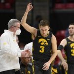 
              Iowa guard Jordan Bohannon (3) gestures after he made a 3-point basket during the second half of the team's NCAA college basketball game against Maryland, Thursday, Feb. 10, 2022, in College Park, Md. (AP Photo/Nick Wass)
            