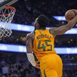 
              Utah Jazz guard Donovan Mitchell (45) dunks against the New York Knicks in the second half of an NBA basketball game, Monday, Feb. 7, 2022, in Salt Lake City. (AP Photo/Rick Bowmer)
            