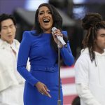 
              Country music artist Mickey Guyton performs the national anthem before the NFL Super Bowl 56 football game between the Los Angeles Rams and the Cincinnati Bengals, Sunday, Feb. 13, 2022, in Inglewood, Calif. (AP Photo/Chris O'Meara)
            