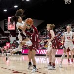 
              Washington State guard Krystal Leger-Walker fouls Stanford guard Haley Jones during the first half of an NCAA college basketball game Thursday, Feb. 24, 2022, in Stanford, Calif. (AP Photo/John Hefti)
            