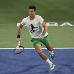 
              Serbia's Novak Djokovic trains a day ahead of the Dubai Duty Free Tennis Championship in Dubai, United Arab Emirates, Sunday, Feb. 20, 2022. (AP Photo/Kamran Jebreili)
            