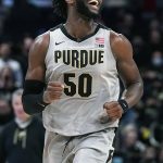 
              Purdue forward Trevion Williams laughs as he runs on the court during the second half of an NCAA college basketball game against Northwestern in Evanston, Ill., Wednesday, Feb. 16, 2022. Purdue won 70-64. (AP Photo/Nam Y. Huh)
            