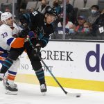 
              New York Islanders defenseman Zdeno Chara (33) defends against against San Jose Sharks right wing Timo Meier (28) during the first period of an NHL hockey game in San Jose, Calif., Thursday, Feb. 24, 2022. (AP Photo/Josie Lepe)
            