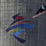 
              Su Yiming of China competes during the men's snowboard big air finals of the 2022 Winter Olympics, Tuesday, Feb. 15, 2022, in Beijing. (AP Photo/Jae C. Hong)
            