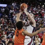 
              Gonzaga forward Drew Timme (2) drives to the basket while pressured by Pacific guard Khaleb Wilson-Rouse (0) during the first half of an NCAA college basketball game, Thursday, Feb. 10, 2022, in Spokane, Wash. (AP Photo/Young Kwak)
            