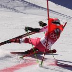 
              Magdalena Luczak of Poland crashes during the mixed team parallel skiing event at the 2022 Winter Olympics, Sunday, Feb. 20, 2022, in the Yanqing district of Beijing. (AP Photo/Luca Bruno)
            