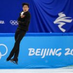 
              Nathan Chen, of the United States, competes during the men's singles short program team event in the figure skating competition at the 2022 Winter Olympics, Friday, Feb. 4, 2022, in Beijing. (AP Photo/David J. Phillip)
            