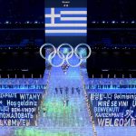 
              Apostolos Angelis and Maria Ntanou, of Greece, lead their team in during the opening ceremony of the 2022 Winter Olympics, Friday, Feb. 4, 2022, in Beijing.(AP Photo/Ashley Landis)
            