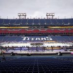 
              The Nashville Predators head on to the ice for a hockey practice in preparation for the Navy Federal Credit Union NHL Stadium Series at Nissan Stadium in Nashville, Tenn., Friday, Feb. 25, 2022. (Andrew Nelles/The Tennessean via AP)
            