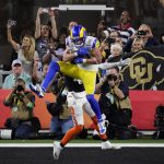 
              Los Angeles Rams wide receiver Cooper Kupp pulls in a touchdown catch as Cincinnati Bengals cornerback Eli Apple defends during the second half of the NFL Super Bowl 56 football game Sunday, Feb. 13, 2022, in Inglewood, Calif. (AP Photo/Julio Cortez)
            