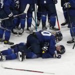 
              Finland celebrates after beating Switzerland in the women's bronze medal hockey game at the 2022 Winter Olympics, Wednesday, Feb. 16, 2022, in Beijing. (AP Photo/Petr David Josek)
            