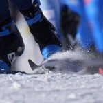 
              FILE - A skier kicks up snow during the men's 15km + 15km skiathlon cross-country skiing competition at the 2022 Winter Olympics, Feb. 6, 2022, in Zhangjiakou, China. (AP Photo/Alessandra Tarantino, File)
            