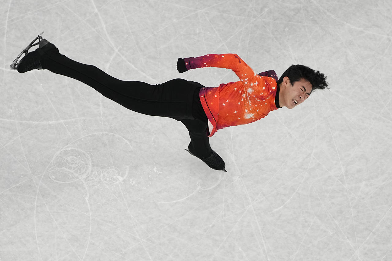 Nathan Chen, of the United States, competes in the men's free skate program during the figure skati...