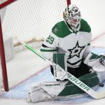 
              Dallas Stars goaltender Jake Oettinger makes a save against the Colorado Avalanche during the third period of an NHL hockey game Tuesday, Feb. 15, 2022, in Denver. The Stars won 4-1. (AP Photo/David Zalubowski)
            