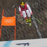 
              Max Franz of Austria makes a jump during men's downhill training at the 2022 Winter Olympics, Friday, Feb. 4, 2022, in the Yanqing district of Beijing. (AP Photo/Luca Bruno)
            
