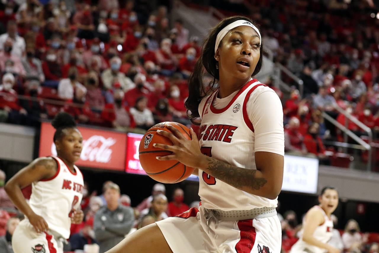 North Carolina State's Jada Boyd (5) grabs a rebound during the first half of the team's NCAA colle...
