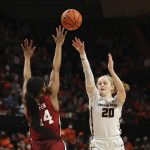 
              Oregon State's Ellie Mack (20) shoots over Stanford's Kiki Iriafen (44) during the first half of an NCAA college basketball game in Corvallis, Ore., Friday, Feb. 18, 2022. (AP Photo/Amanda Loman)
            
