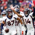 HOUSTON, TEXAS - DECEMBER 08:  Noah Fant #87 of the Denver Broncos celebrates his touchdown in the first quarter with teammate Courtland Sutton #14 in the first quarter against the Houston Texans at NRG Stadium on December 08, 2019 in Houston, Texas. (Photo by Tim Warner/Getty Images)