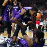 LAS VEGAS, NEVADA - MARCH 11: Mahki Morris #12 and Ja’Sean Jackson #2 of the Abilene Christian Wildcats react during a semifinal game of the Western Athletic Conference basketball tournament against the Seattle Redhawks at the Orleans Arena on March 11, 2022 in Las Vegas, Nevada. (Photo by Joe Buglewicz/Getty Images)