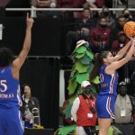 
              Kansas forward Ioanna Chatzileonti (10) takes a 3-point shot as guard Aniya Thomas (5) reacts during the first half of a second-round game against Stanford in the NCAA women's college basketball tournament Sunday, March 20, 2022, in Stanford, Calif. (AP Photo/Tony Avelar)
            