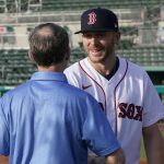 
              New Boston Red Sox shortstop Trevor Story, right, shakes the hand of general manager Brian O'Halloran, after a baseball press conference at JetBlue Park Wednesday, March 23, 2022, in Fort Myers, Fla. (AP Photo/Steve Helber)
            
