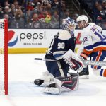 
              New York Islanders forward Josh Bailey, right, scores past Columbus Blue Jackets goalie Elvis Merzlikins during the first period of an NHL hockey game in Columbus, Ohio, Tuesday, March 29, 2022. (AP Photo/Paul Vernon)
            