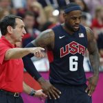 
              FILE - United States coach Mike Krzyzewski talks with LeBron James during a men's basketball game against Lithuania at the 2012 Summer Olympics in London, Aug. 4, 2012. The basketball coach's fingerprints are all over the highest levels of the game after a nearly five-decade head-coaching career. (AP Photo/Charles Krupa, File)
            