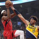 
              Toronto Raptors forward Precious Achiuwa (5) shoots as Indiana Pacers forward Justin Anderson (10) defends during the first half of an NBA basketball game Saturday, March 26, 2022, in Toronto. (Frank Gunn/The Canadian Press via AP)
            
