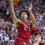 
              Rutgers forward Ron Harper Jr. (24) shoots during the first half of an NCAA college basketball game against Indiana, Wednesday, March 2, 2022, in Bloomington, Ind. (AP Photo/Doug McSchooler)
            