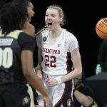 
              Stanford's Cameron Brink (22) celebrates after scoring against the Colorado during the first half of an NCAA college basketball game in the semifinal round of the Pac-12 women's tournament Friday, March 4, 2022, in Las Vegas. (AP Photo/John Locher)
            