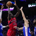 
              Toronto Raptors' Pascal Siakam (43) goes up for a shot against Philadelphia 76ers' Matisse Thybulle, from left, Georges Niang and Joel Embiid during the first half of an NBA basketball game, Sunday, March 20, 2022, in Philadelphia. (AP Photo/Matt Slocum)
            