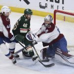 
              Minnesota Wild defenseman Jared Spurgeon (46) tries to score a goal against Colorado Avalanche goaltender Darcy Kuemper (35) during the third period of an NHL hockey game Sunday, March 27, 2022, in St. Paul, Minn. Minnesota won 3-2 in overtime. (AP Photo/Stacy Bengs)
            