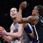 
              Brooklyn Nets' Nic Claxton (33) defends Detroit Pistons' Kelly Olynyk during the first half of an NBA basketball game Tuesday, March 29, 2022 in New York. (AP Photo/Frank Franklin II)
            