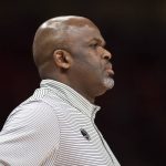 
              Atlanta Hawks head Coach Nate McMillan looks at the court during the first half of an NBA basketball game against the Golden State Warriors, Friday, March 25, 2022, in Atlanta. (AP Photo/Hakim Wright Sr.)
            