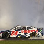 
              NASCAR Cup Series driver William Byron (24) does a burnout to celebrate winning the the NASCAR Cup Series auto race at Atlanta Motor Speedway in Hampton, Ga., Sunday, March 20, 2022, (AP Photo/John Bazemore)
            