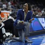 
              California head coach Charmin Smith motions towards the bench during the second half of an NCAA college basketball game against the Utah in the first round of the Pac-12 women's tournament Wednesday, March 2, 2022, in Las Vegas. (AP Photo/John Locher)
            