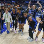 
              Kentucky players and staff dance and celebrate after beating LSU in an NCAA college basketball game at the women's Southeastern Conference tournament Friday, March 4, 2022, in Nashville, Tenn. (AP Photo/Mark Humphrey)
            