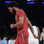 
              St. John's Julian Champagnie reacts after the team's NCAA college basketball game against Villanova at the Big East men's tournament Thursday, March 10, 2022, in New York. Villanova won 66-65. (AP Photo/Frank Franklin II)
            