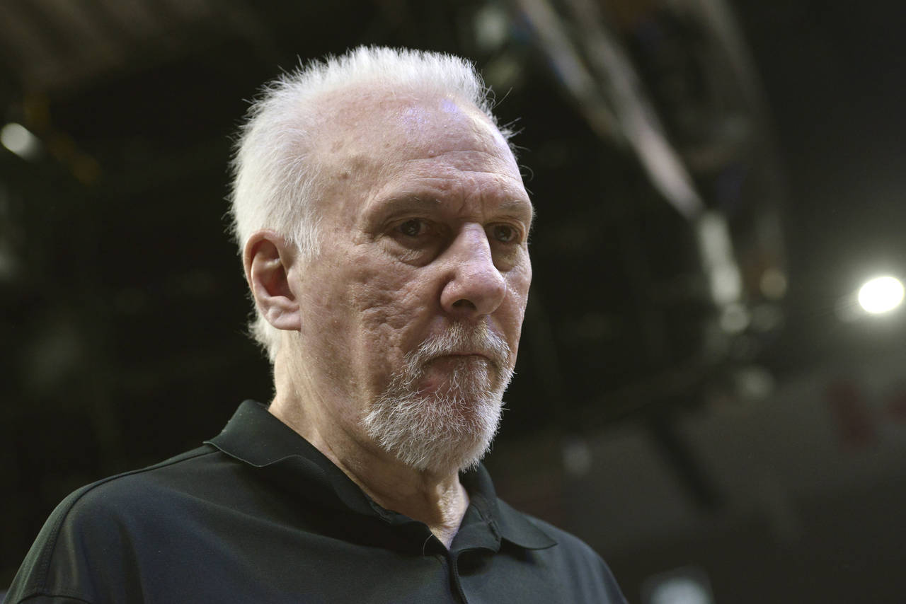 San Antonio Spurs coach Gregg Popovich stands on the court during the first half of the team's NBA ...
