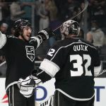 
              Los Angeles Kings defenseman Sean Durzi, left, and goaltender Jonathan Quick (32) celebrate after a 6-1 win over the Nashville Predators in an NHL hockey game Tuesday, March 22, 2022, in Los Angeles. (AP Photo/Ashley Landis)
            