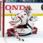 
              Carolina Hurricanes goaltender Antti Raanta (32) makes a save on a shot by the Tampa Bay Lightning during the second period of an NHL hockey game Tuesday, March 29, 2022, in Tampa, Fla. (AP Photo/Chris O'Meara)
            