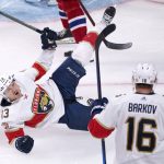 
              Florida Panthers' Sam Reinhart falls as he celebrates after scoring past Montreal Canadiens goaltender Jake Allen during third-period NHL hockey game action in Montreal, Thursday, March 24, 2022. (Paul Chiasson/The Canadian Press via AP)
            