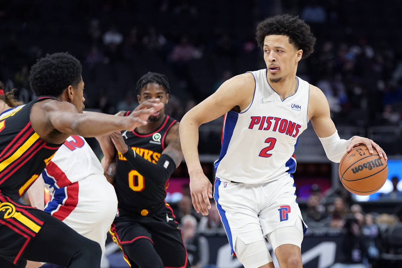 Detroit Pistons guard Cade Cunningham (2) looks to pass during the first half of an NBA basketball ...