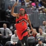 
              Toronto Raptors forward Precious Achiuwa gestures to the bench after hitting a basket against the Denver Nuggets in the second half of an NBA basketball game Saturday, March 12, 2022, in Denver. (AP Photo/David Zalubowski)
            