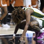 
              Baylor forward NaLyssa Smith reacts after having an offensive foul called against her during the first half of an NCAA college basketball championship game against Texas in the Big 12 Conference tournament in Kansas City, Mo., Sunday, March 13, 2022. (AP Photo/Reed Hoffmann)
            