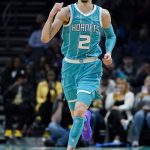 
              Charlotte Hornets guard LaMelo Ball celebrates during the second half of an NBA basketball game against the San Antonio Spurs on Saturday, March 5, 2022, in Charlotte, N.C. (AP Photo/Chris Carlson)
            