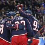 
              Columbus Blue Jackets players celebrate their goal against the New Jersey Devils during the second period of an NHL hockey game Tuesday, March 1, 2022, in Columbus, Ohio. (AP Photo/Jay LaPrete)
            