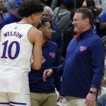 
              Kansas head coach Bill Self smiles with Jalen Wilson during the second half of a college basketball game in the Elite 8 round of the NCAA tournament Sunday, March 27, 2022, in Chicago. Kansas won 76-50 to advance to the Final Four. (AP Photo/Nam Y. Huh)
            