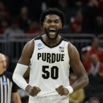 
              Purdue's Trevion Williams celebrates during the second half of a second-round NCAA college basketball tournament game against Texas Sunday, March 20, 2022, in Milwaukee. Purdue won 81-71. (AP Photo/Jeffrey Phelps)
            